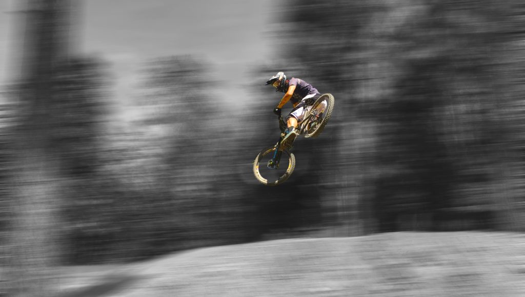 Troydon, whipping his mountain bike at Snow Summit bike park, California